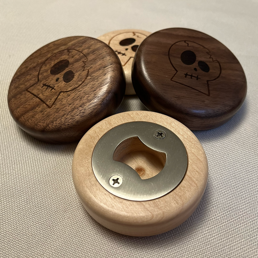 bottle openers group walnut and maple showing skull logo on front and stainless opener on back